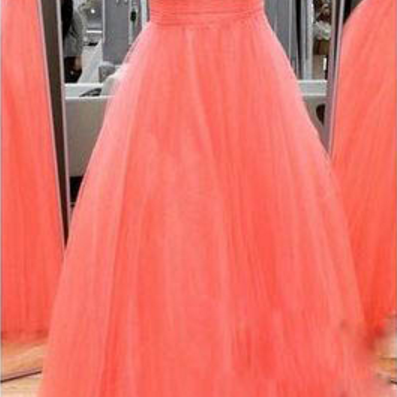 A Sheath Dress Trimmed With Beads, A Coral-colored..