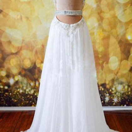 A Clear White Ball Gown With A Chiffon Gown,..