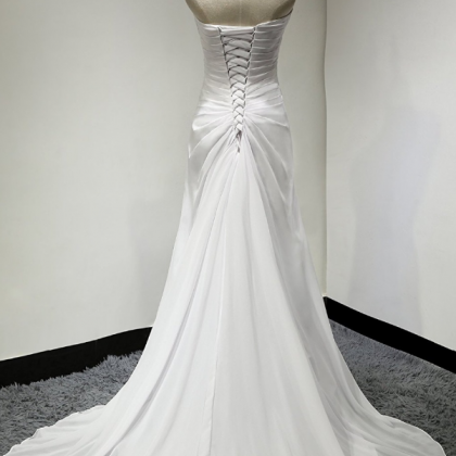 A Long, Formal Scale And Party Dress For The..