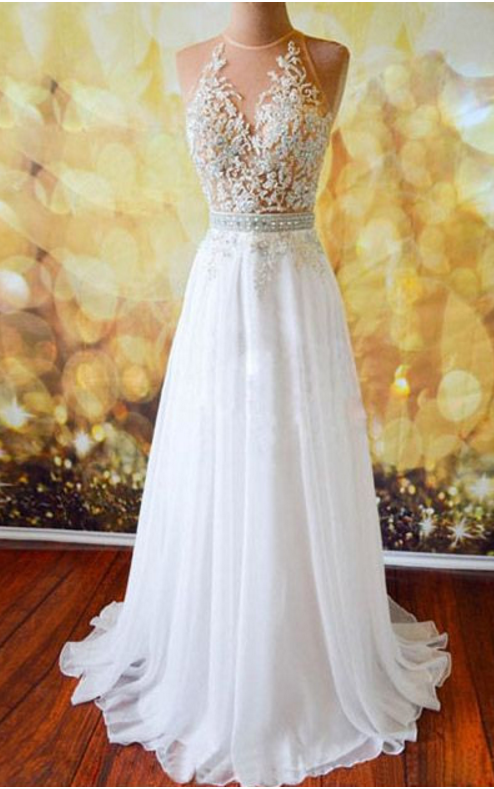 A Clear White Ball Gown With A Chiffon Gown, Evening Dress.