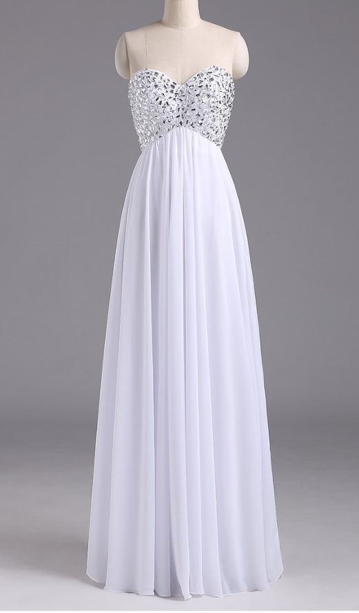 A Sleeveless White Long Chiffon Gown With A Crystal And Evening Gown.