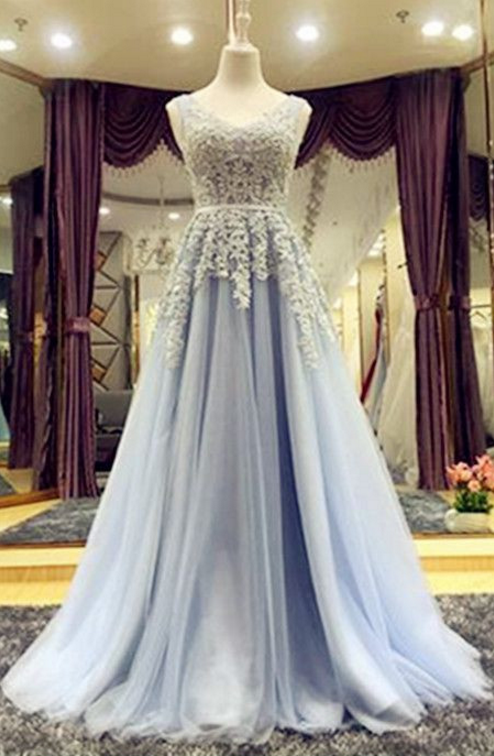 A Blue, Sleeveless Ball Gown, Evening Dress.