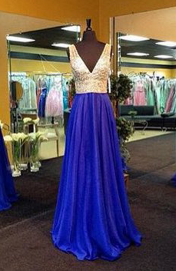 The Royal Blue Beads Are Decorated With Crystal Ball Gowns And V-neck Gowns.