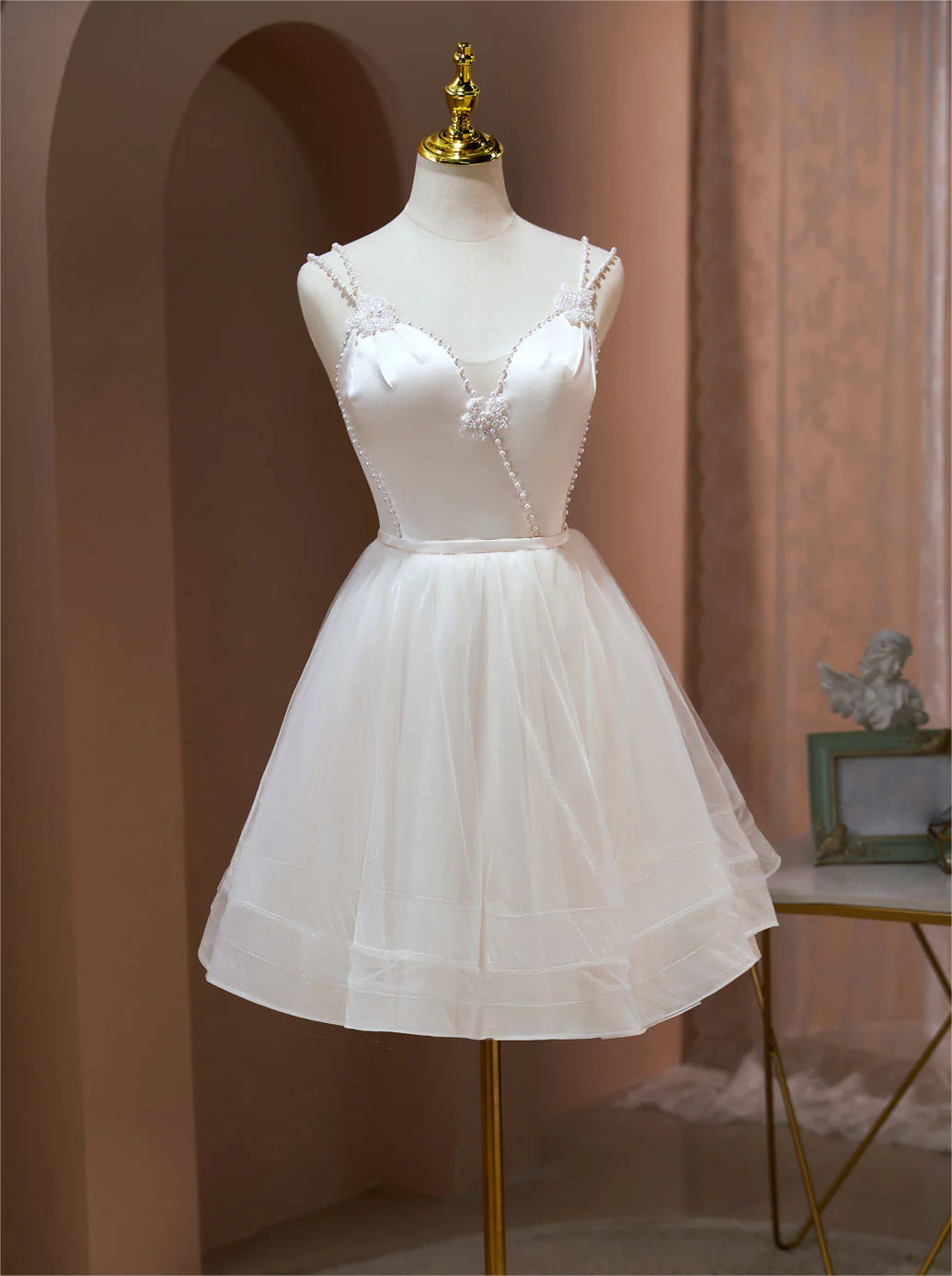 short beige dresses Beige Short Dress With O-Ring Front And Long Sleeves main image 1