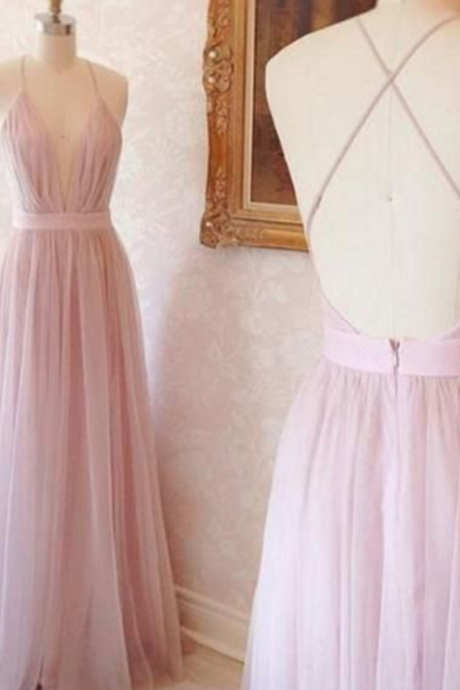 A Pale Pink Ball Gown And A Sleeveless Gown With A Shoulder Strap And An Evening Dress.