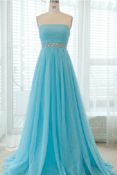 A Strapless Long Blue Dress With Pleated Bodice And Evening Dress.