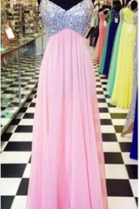 A Jewel-pink Ball Gown With A V-neck Evening Gown.