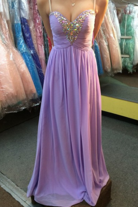 A Light Purple Chiffon Ball Gown And Strapless Dress With Strapless Evening Dress.
